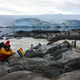 Aaron Jackson raising the rainbow flag with his (potentially gay?) penguin friends.